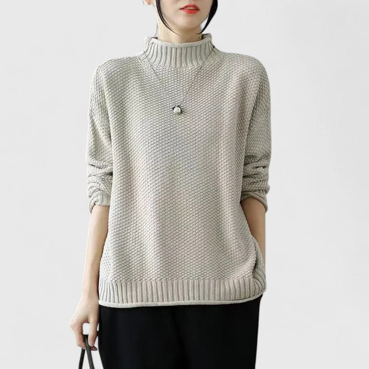 Sophisticated women's long sleeve mock neck sweater, elegant textured knit for a chic look.