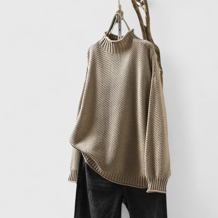 Cozy women's textured knit mock neck sweater, long sleeve, perfect for cold weather.