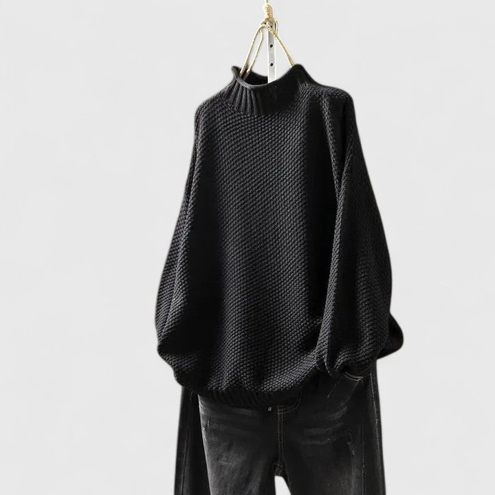 Relaxed fit women's mock neck sweater, soft textured knit for comfortable autumn days.