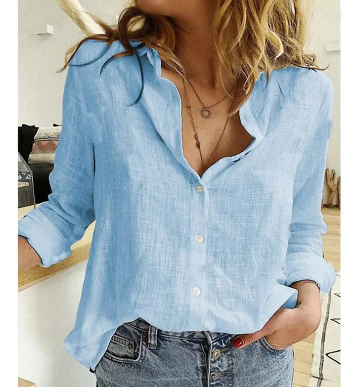 Comfortable relaxed fit long-sleeve V-neck blouse for women, stylish everyday wear.