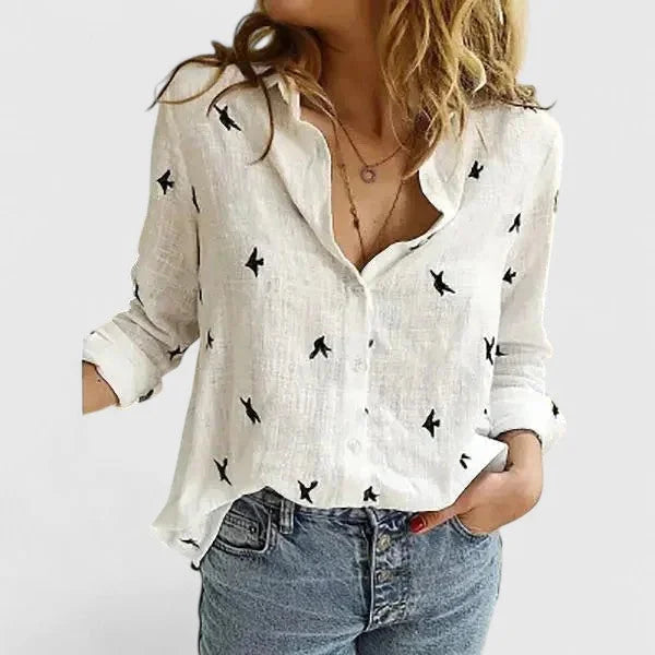 Everyday chic: Women's textured V-neck relaxed fit blouse with long sleeves.