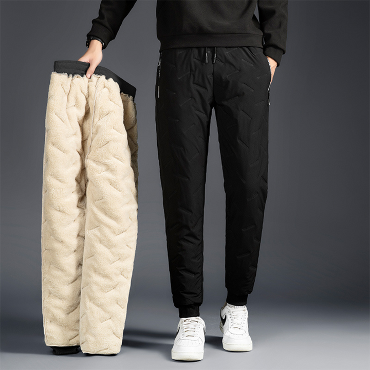 High-performance women's thermal waterproof trousers, providing ultimate warmth & protection for winter.