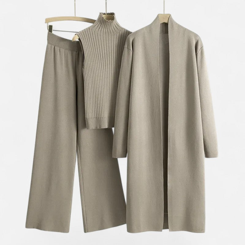 Women's three-piece knit set: long sleeve cardigan, vest top, and trousers.