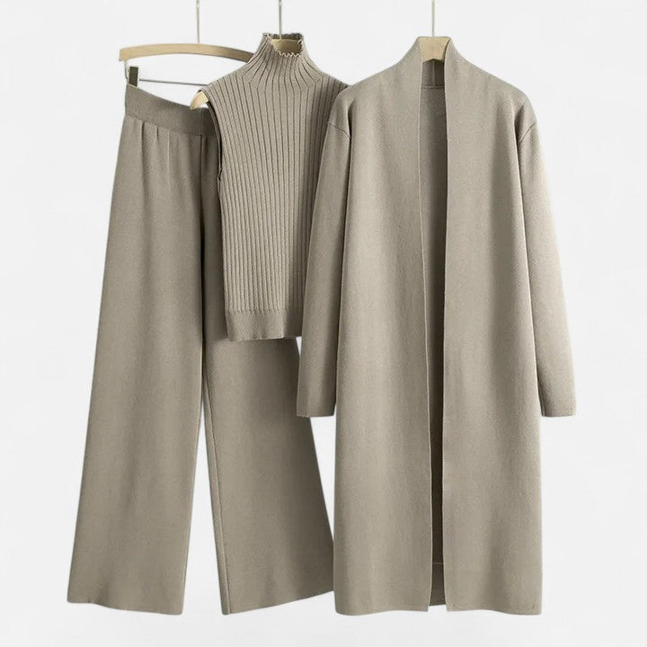 Women's three-piece knit set: long sleeve cardigan, vest top, and trousers.