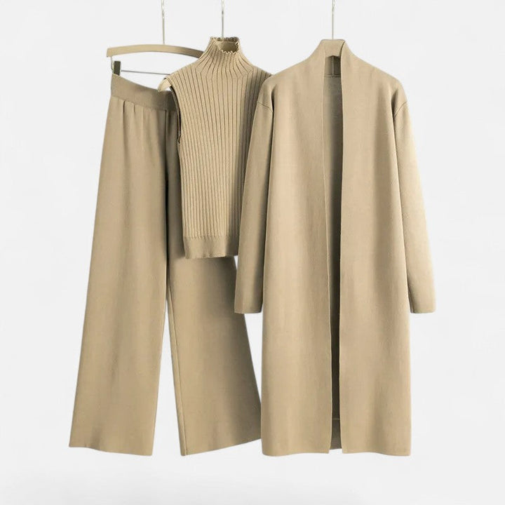 Warm and trendy: women's winter knit set with cardigan, vest, and trousers.