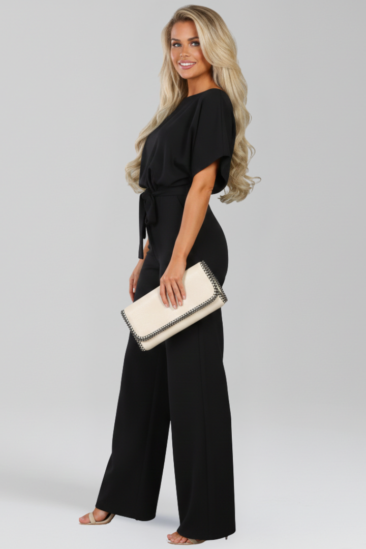Elegant women's classic wide-leg jumpsuit with a flattering tie-belt. Ideal for summer everyday wear.