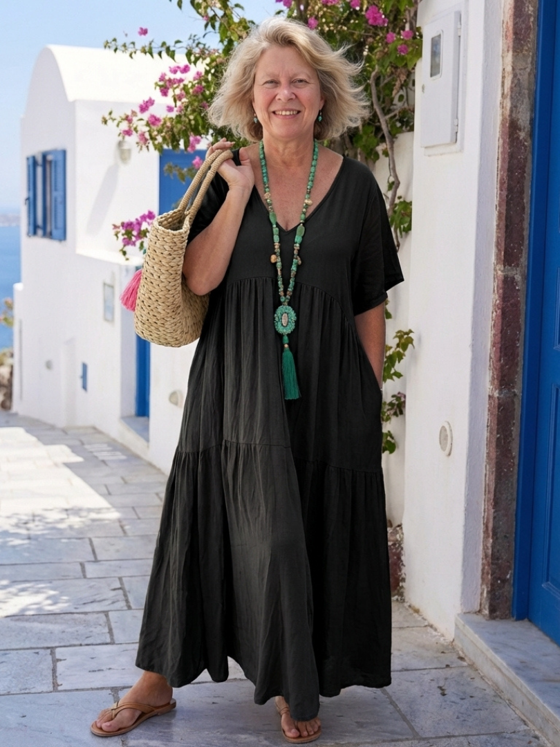 Effortless women's tiered maxi dress with short sleeves, a stylish and flowy summer casual dress.