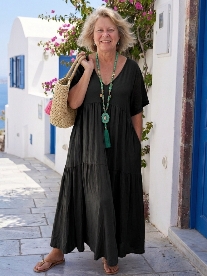 Effortless women's tiered maxi dress with short sleeves, a stylish and flowy summer casual dress.