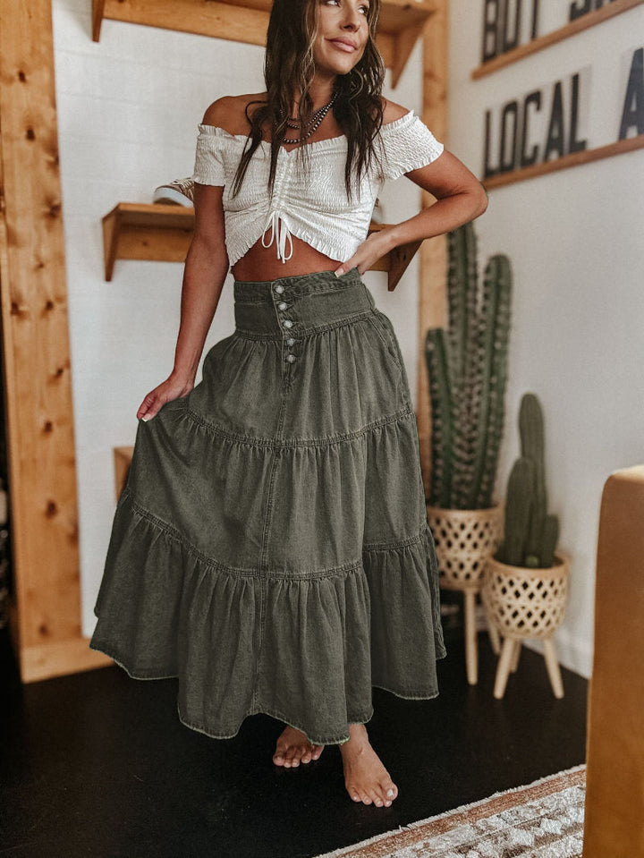 Full-length tiered maxi skirt for women, featuring a classic button front & fashionable raw hem.