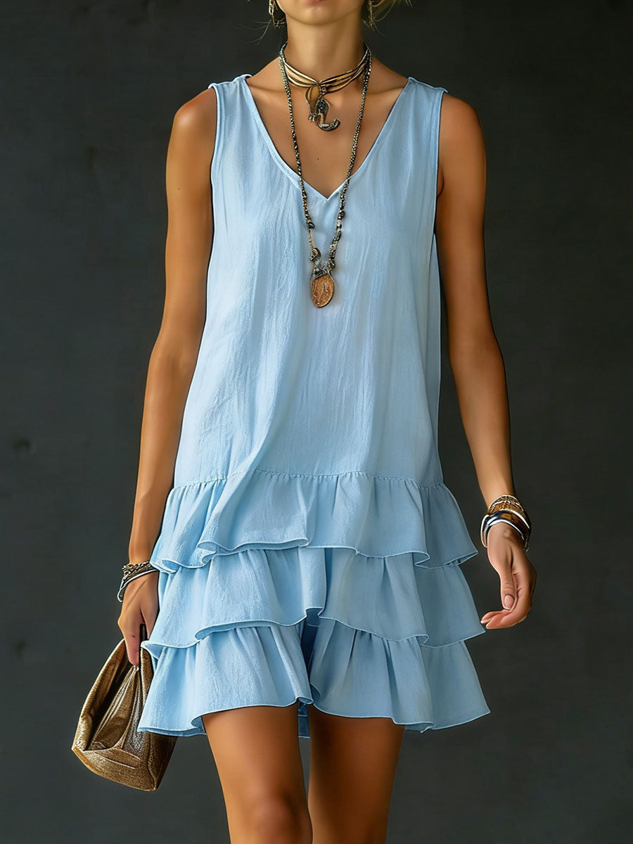 Stylish women's summer mini dress. Features tiered ruffles & V-neck for a chic, relaxed fit fashion statement.