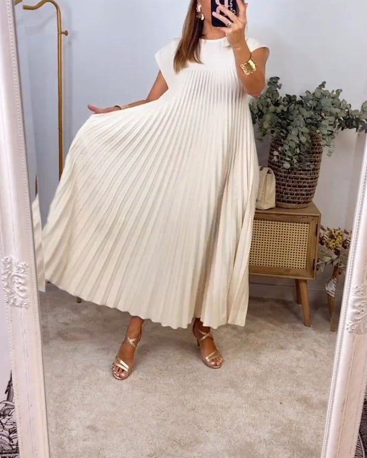 Versatile women's flowy midi dress. A-Line design offering timeless comfort for summer style.