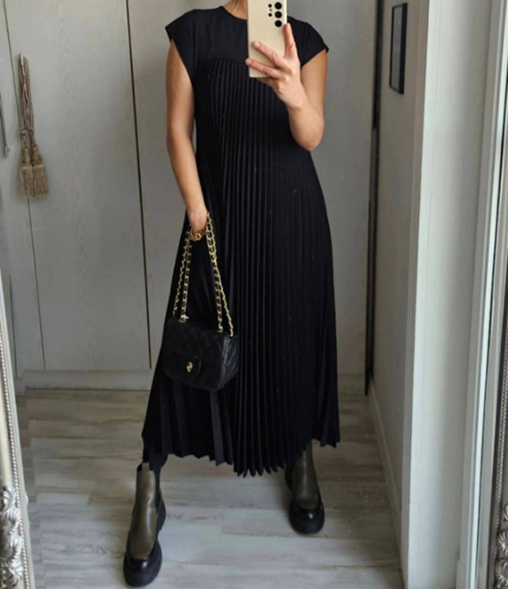 Chic sleeveless A-Line dress for women. Comfortable, flowy midi style for summer elegance.