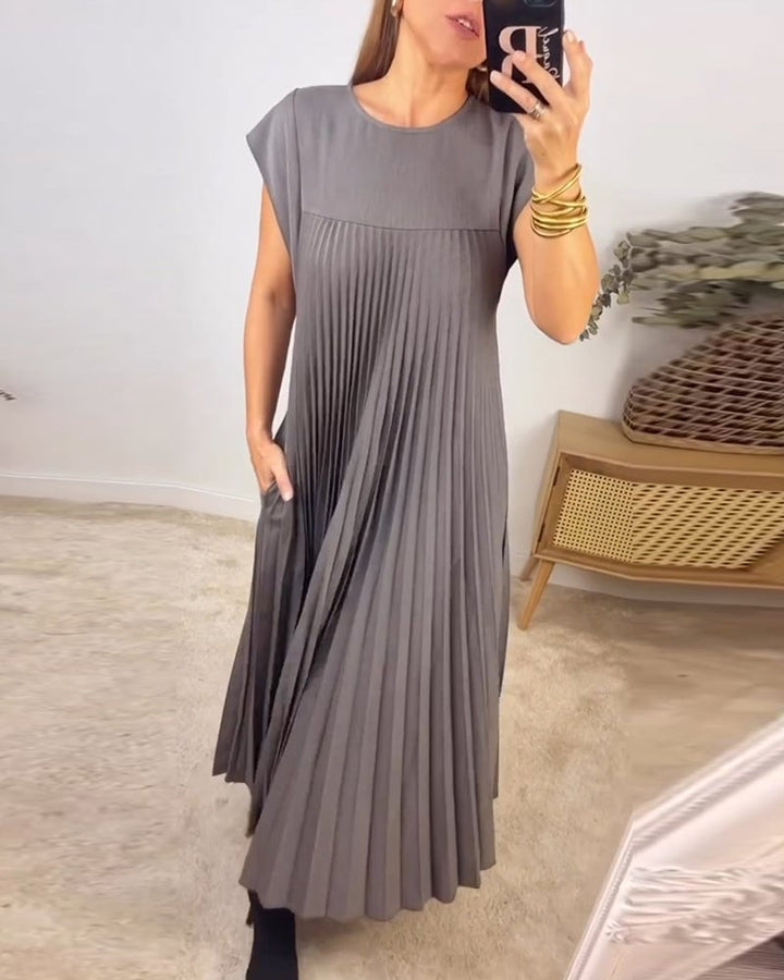 Sophisticated women's flowy A-Line dress. Timeless, comfortable midi for summer style.