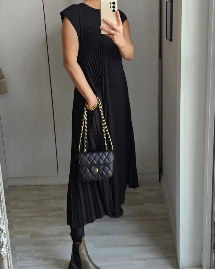 Lightweight sleeveless A-Line dress for women. Flowy, comfortable for effortless summer fashion.
