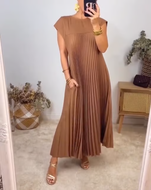 Sleeveless flowy A-Line midi dress for women. Ideal for hot summer days, versatile comfort.