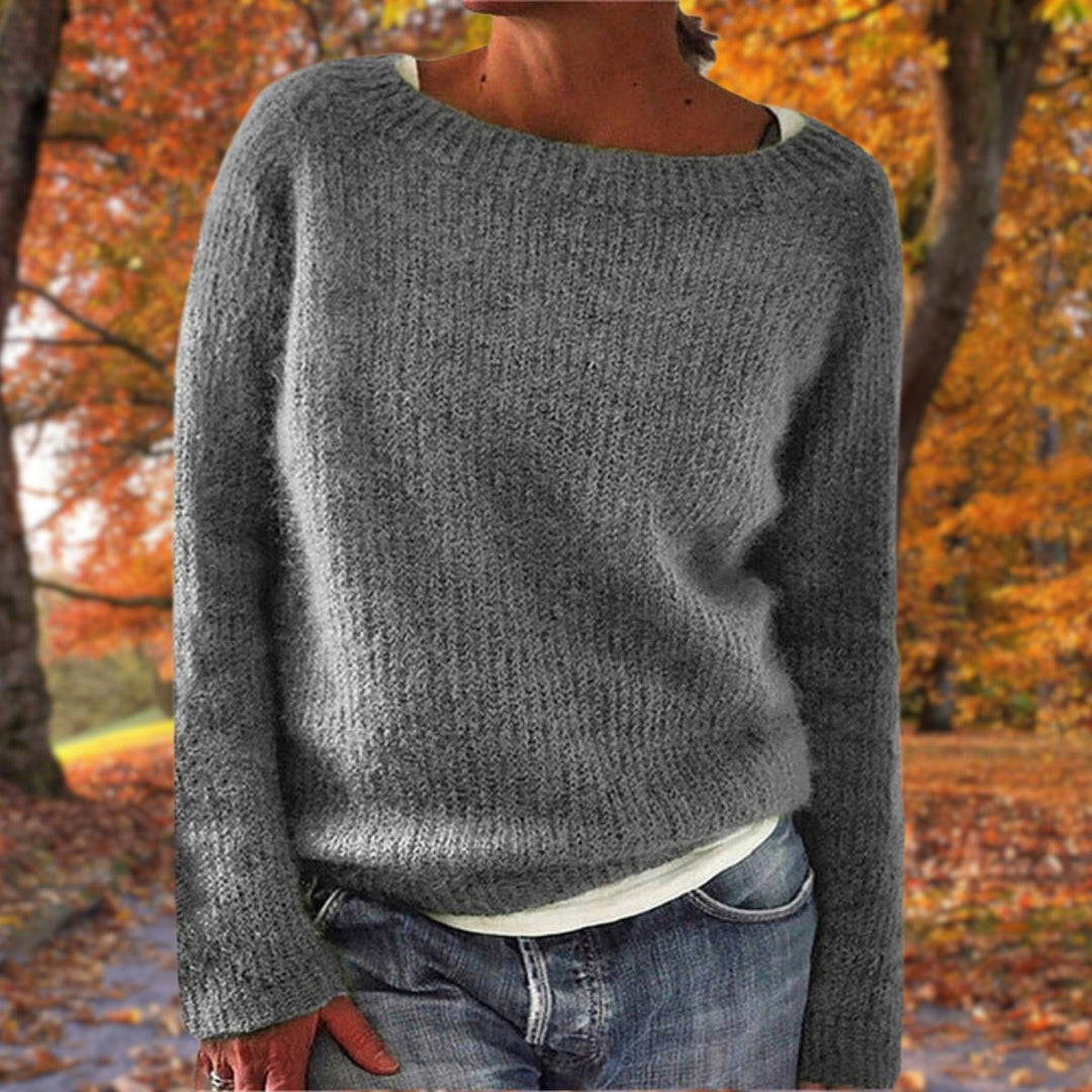 Cozy women's knit sweater in a timeless design. Soft, comfortable, perfect for autumn & winter relaxed fit.