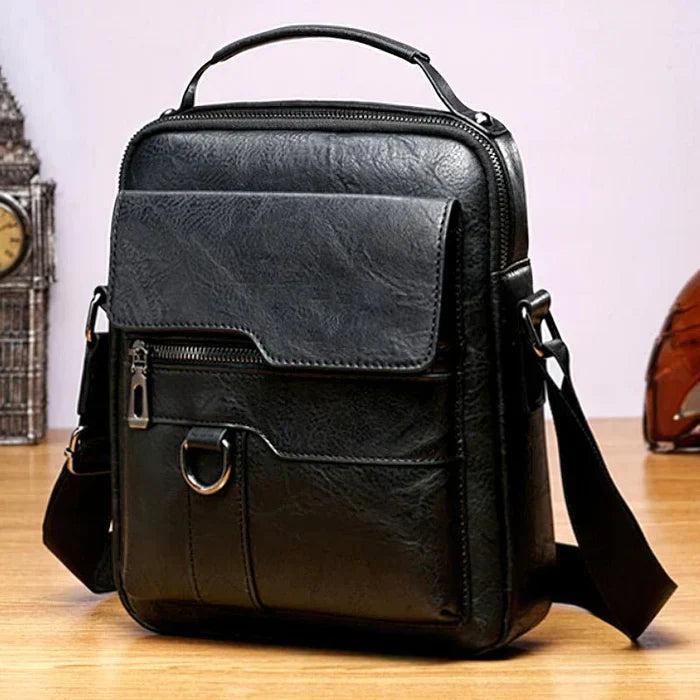 Elegant women's leather handbag with a classic, versatile design for any occasion.