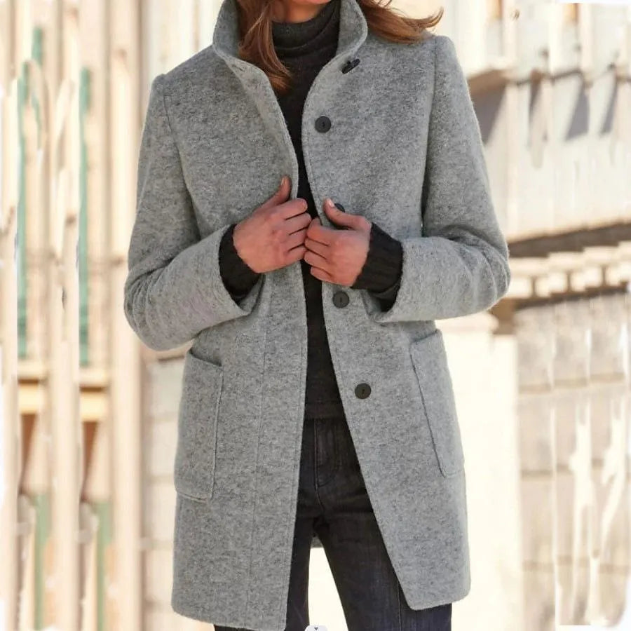 Experience comfort and chic style with this timeless women's long coat.