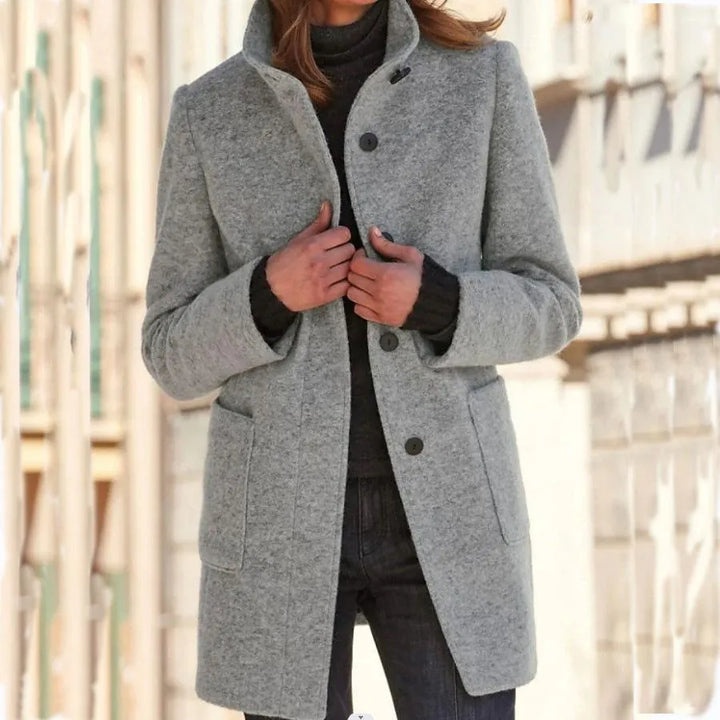 Experience comfort and chic style with this timeless women's long coat.