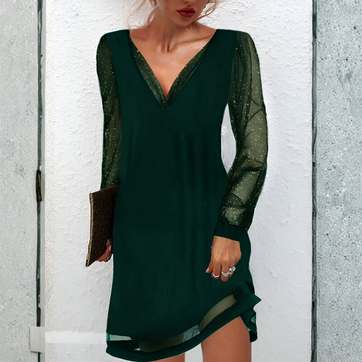 Model wearing a sustainable women's dress, blending elegant design with conscious fashion choices.