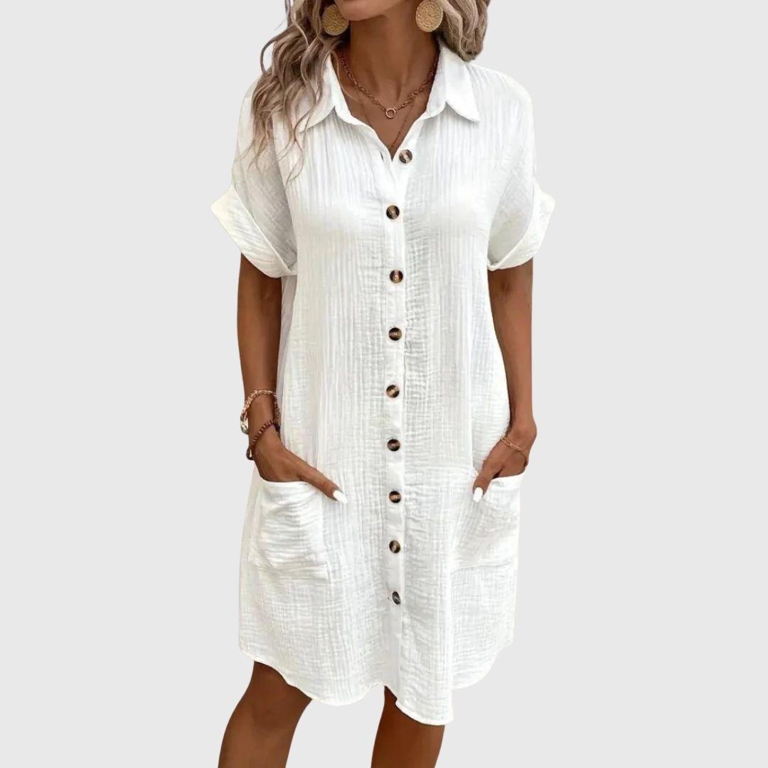 Women's timeless V-neck blouse midi dress, elegant & versatile for day or evening wear.