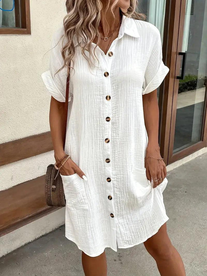 Elegant women's midi blouse dress with V-neck, a timeless versatile fashion statement.