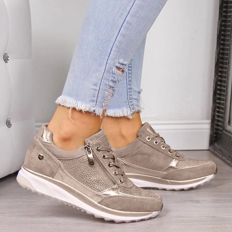 Women's TreadEase cushioned sneakers with zip closure for easy, comfortable all-day wear.