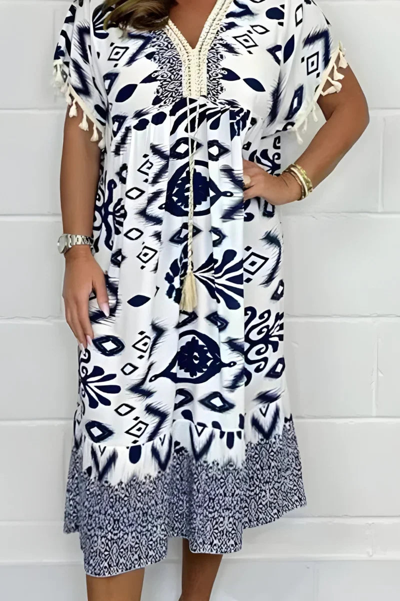 Stylish women's tribal print V-neck midi dress, a versatile loose fit casual dress for summer fashion.