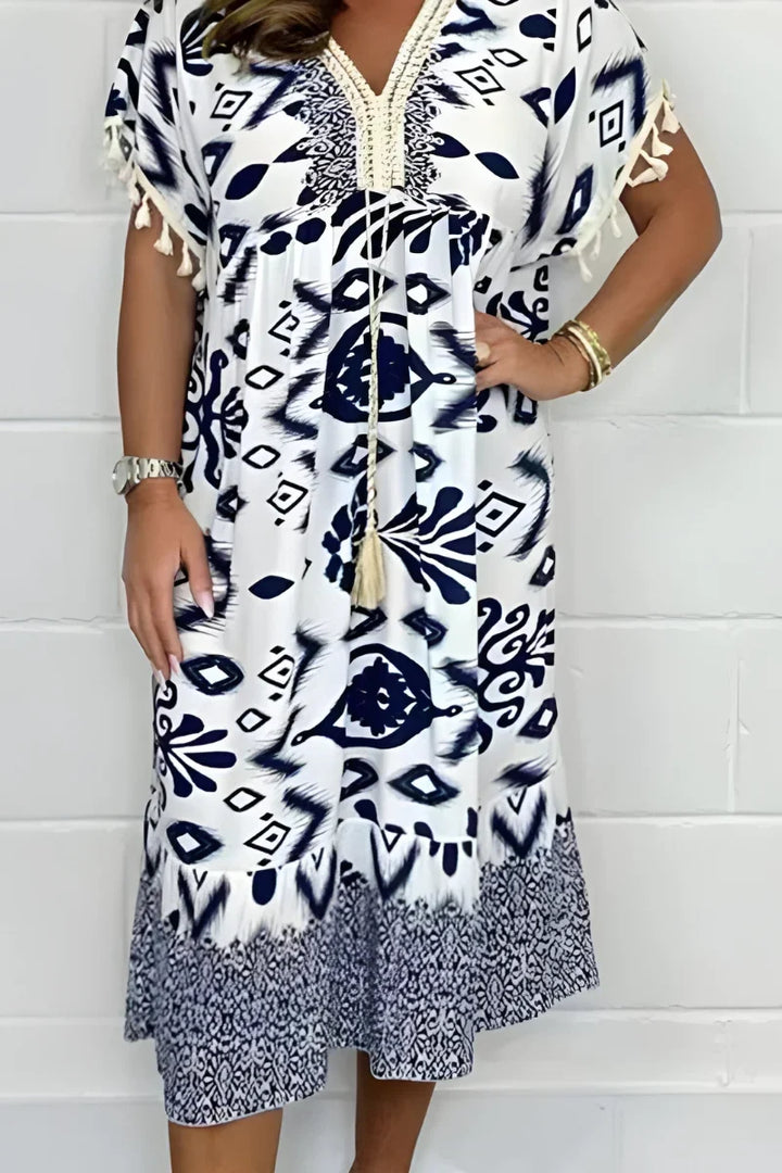 Stylish women's tribal print V-neck midi dress, a versatile loose fit casual dress for summer fashion.
