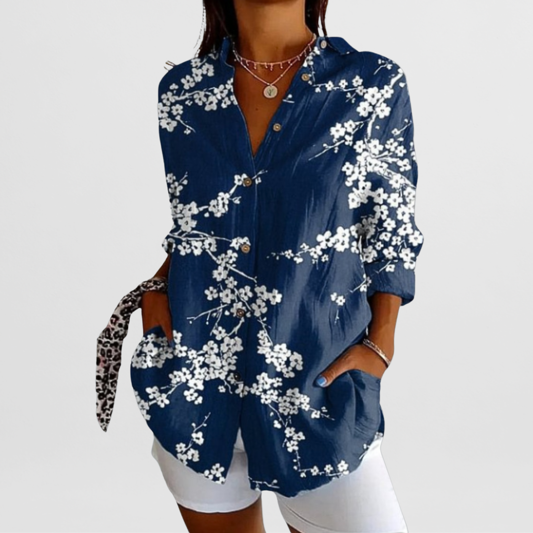 Elegant ladies' tropical floral print loose fit blouse. Versatile long sleeve top for summer & casual wear.