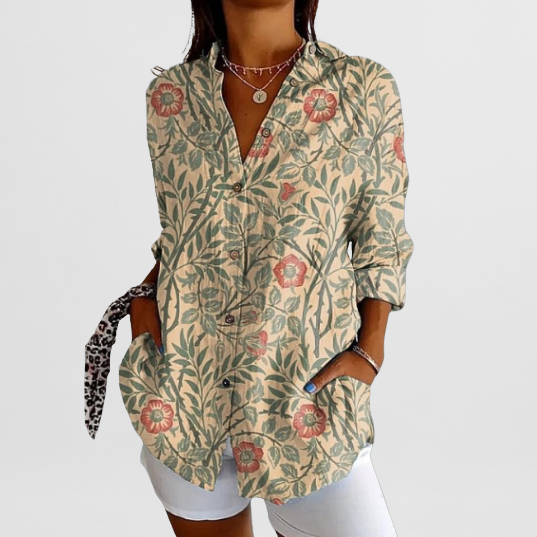 Chic women's loose fit tropical floral blouse. Perfect long sleeve button-down for summer casual wear.