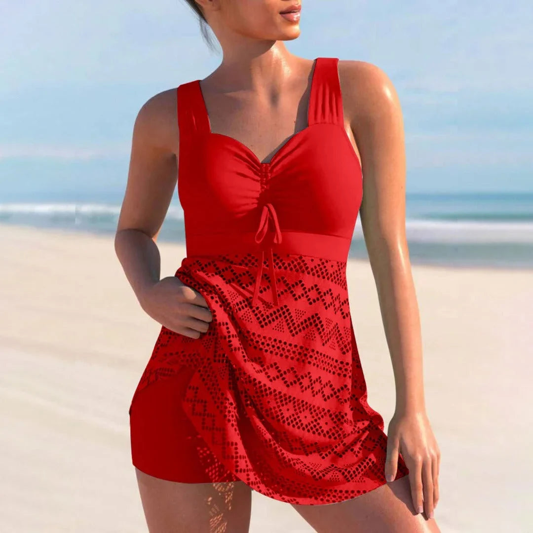 Chic women's tankini beachwear with a comfortable tummy control fit, elegant ruched bust, and flowing skirt.