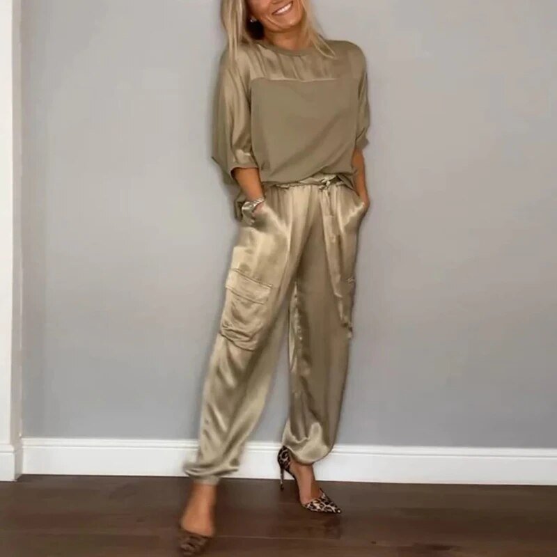 Women's two-piece matching set with a top and straight-leg utility pocket trousers, perfect for casual wear.