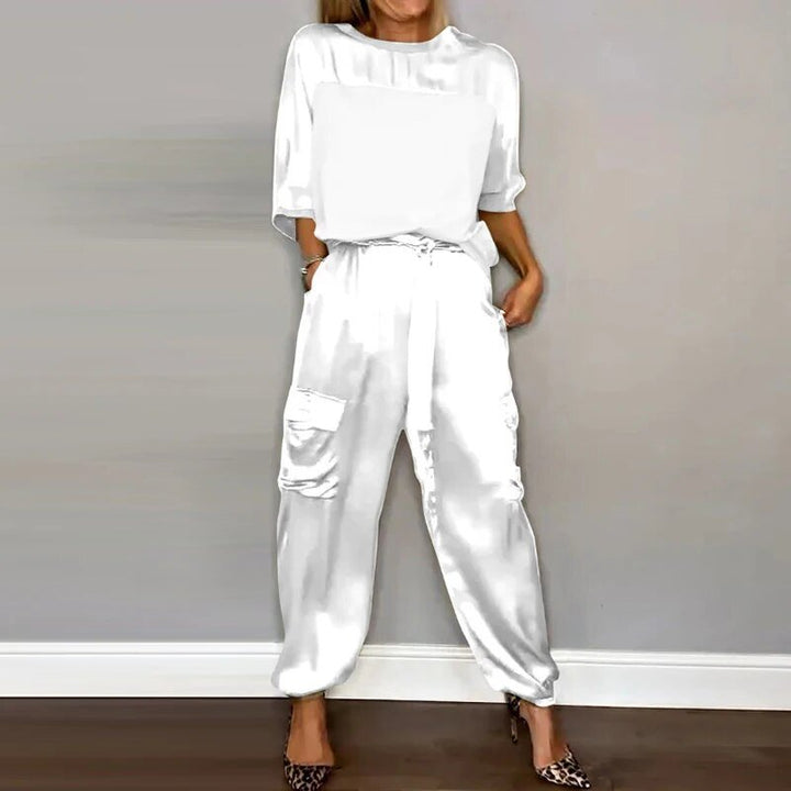Plus-size women's outfit with straight-leg utility pocket trousers and a matching top, ideal for casual comfort.