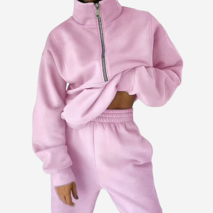 Stylish women's relaxed-fit two-piece jogger tracksuit set, perfect for lounging or everyday fashion.