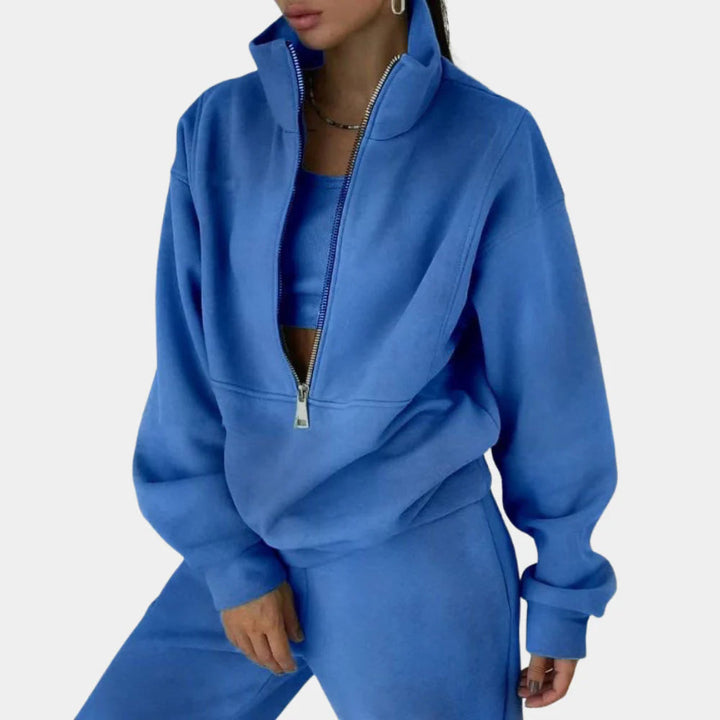 Comfortable women's two-piece lounge set with soft pullover top and matching jogger pants.