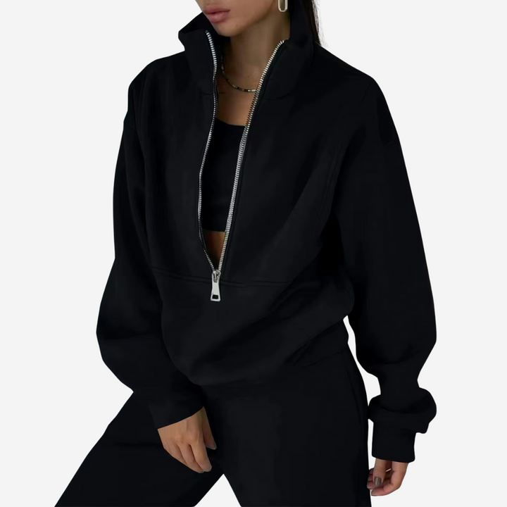 Women's matching two-piece set featuring a cozy pullover top and relaxed-fit jogger bottoms.