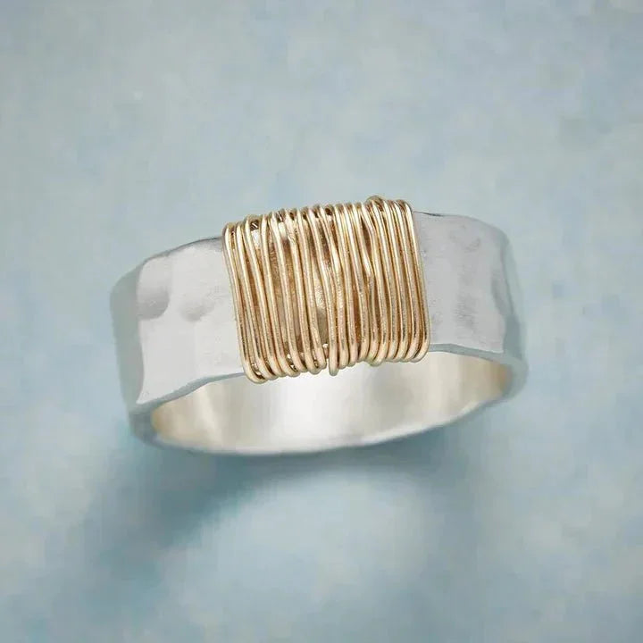 Women's two-tone hammered wide band ring with gold wire. A stylish fashion jewelry statement accessory.