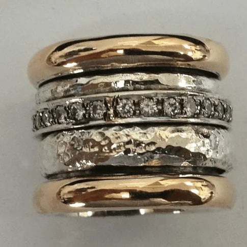 Women's two-tone layered ring with hammered silver band and sparkling crystal eternity band. Elegant fashion jewelry.