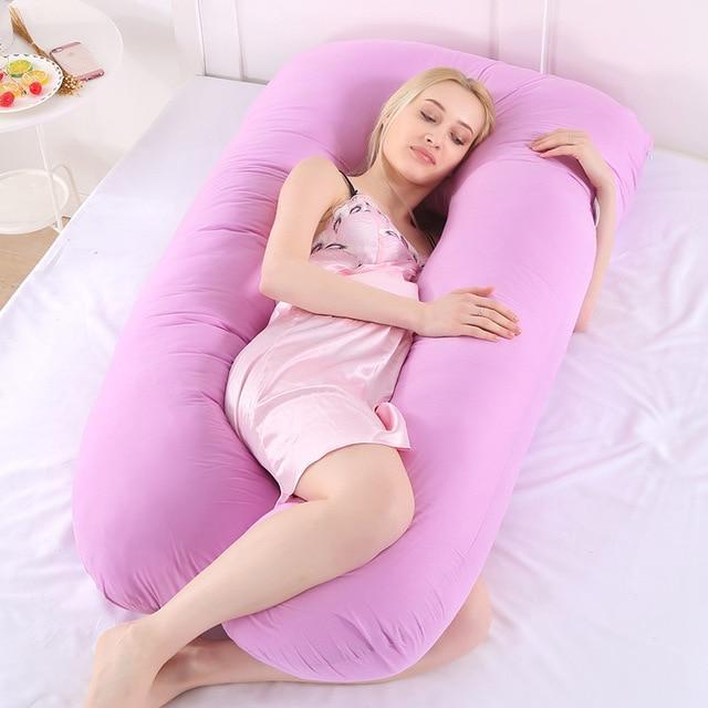 Ergonomic U-shape pregnancy pillow for full body support, ideal for expecting mothers during sleep.