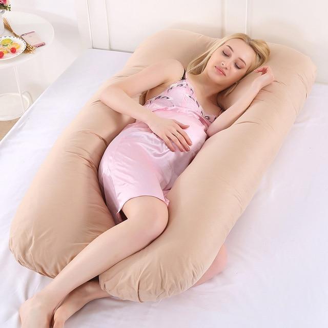 Supportive U-shape pregnancy pillow for expecting mothers, alleviating back and belly discomfort.