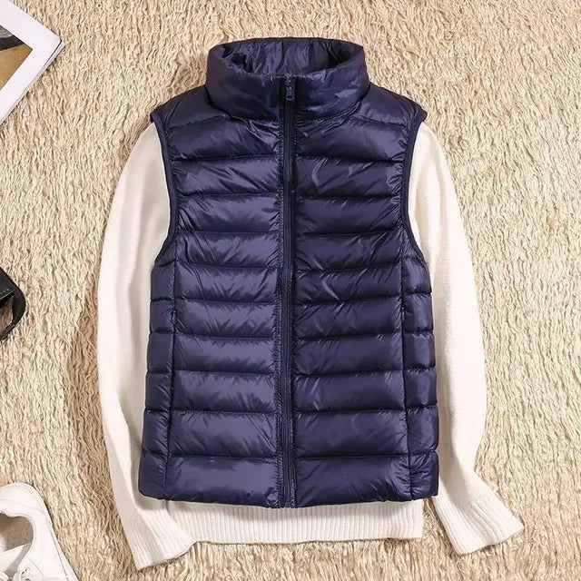Ultra light women's vest, soft & warm for stylish autumn & winter layering & travel.