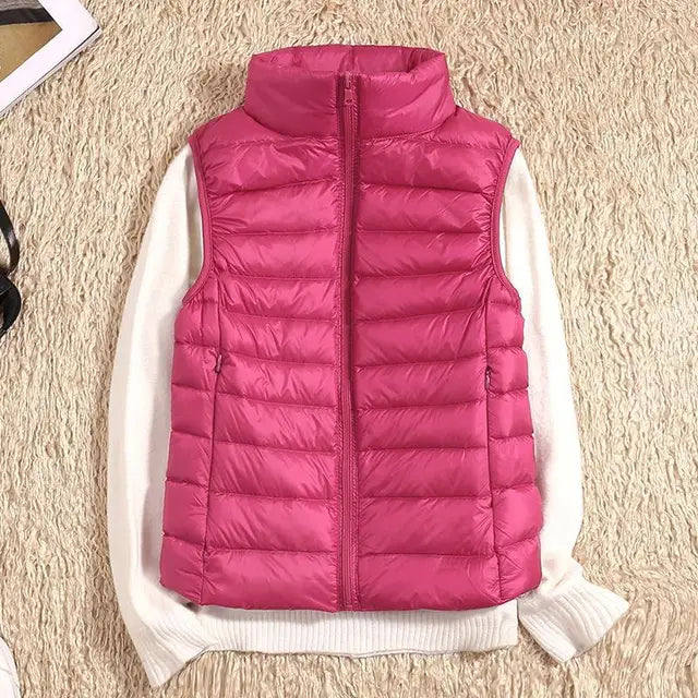 Stay warm & stylish in this ultra light women's vest, ideal for autumn/winter layering.