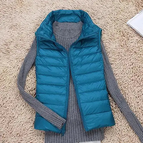 Stylish women's ultra light vest, versatile outerwear for casual wear & travel comfort.