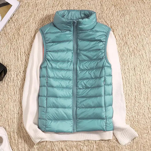 Travel-friendly women's lightweight vest, ideal for warm autumn & winter layering.