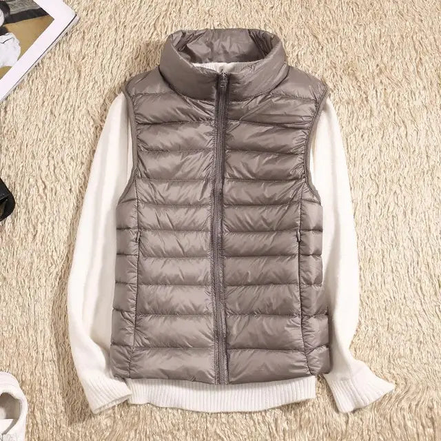 Versatile women's ultra light vest, perfect outerwear for stylish layering in cool weather.