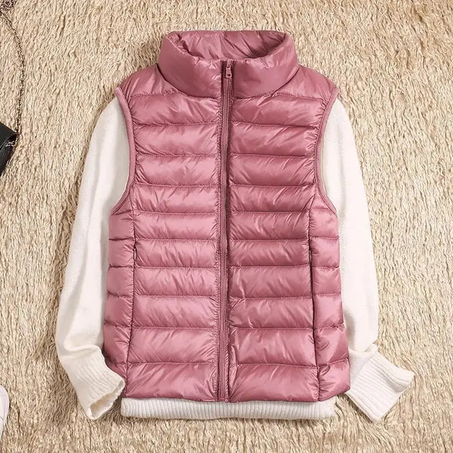Women's lightweight sleeveless jacket, warm & comfortable for casual autumn & winter outings.