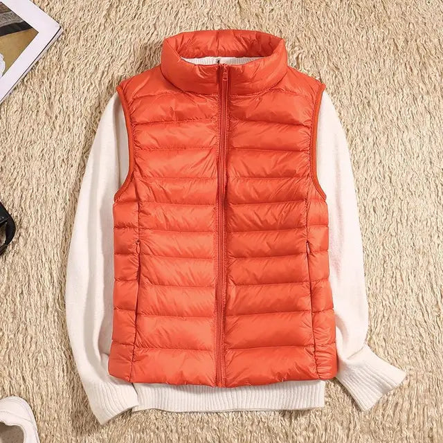 Women's warm, ultra light vest. Stylish and versatile outerwear for autumn & winter travel.