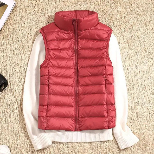 Chic women's ultra light vest, designed for warmth, comfort, and versatile layering.