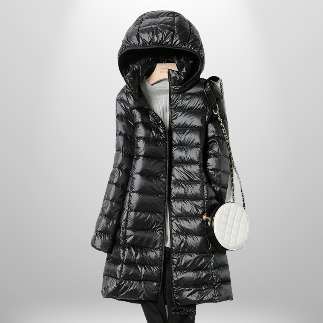Women's travel puffer jacket, ultra-lightweight & packable. Provides warm, essential outerwear for cold trips.